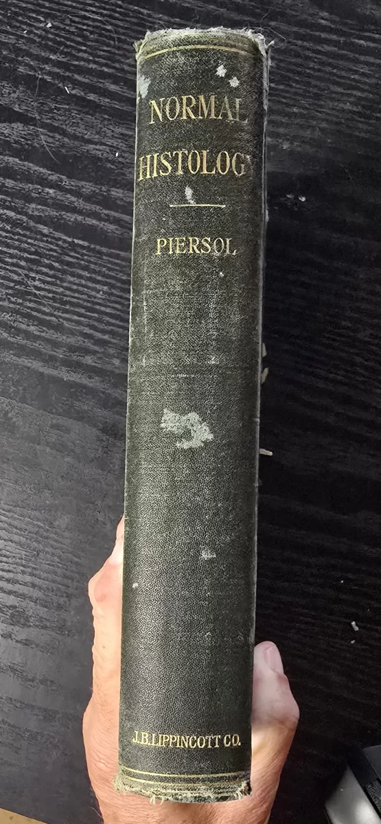 Spine of 1895 medical textbook 'Text-Book of Normal Histology' by George A. Piersol, published by J. B. Lippincott Co.