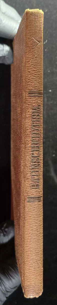 Spine of “Baunscheidtism” handbook showing embossed title
