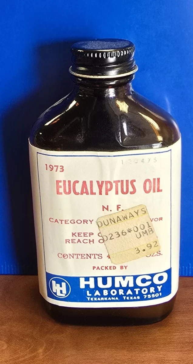 Front of 1973 HUMCO eucalyptus oil bottle with pharmacy label