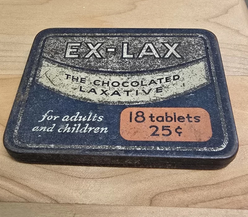 Vintage Ex-Lax tin with blue and orange label, 18 tablets for 25 cents