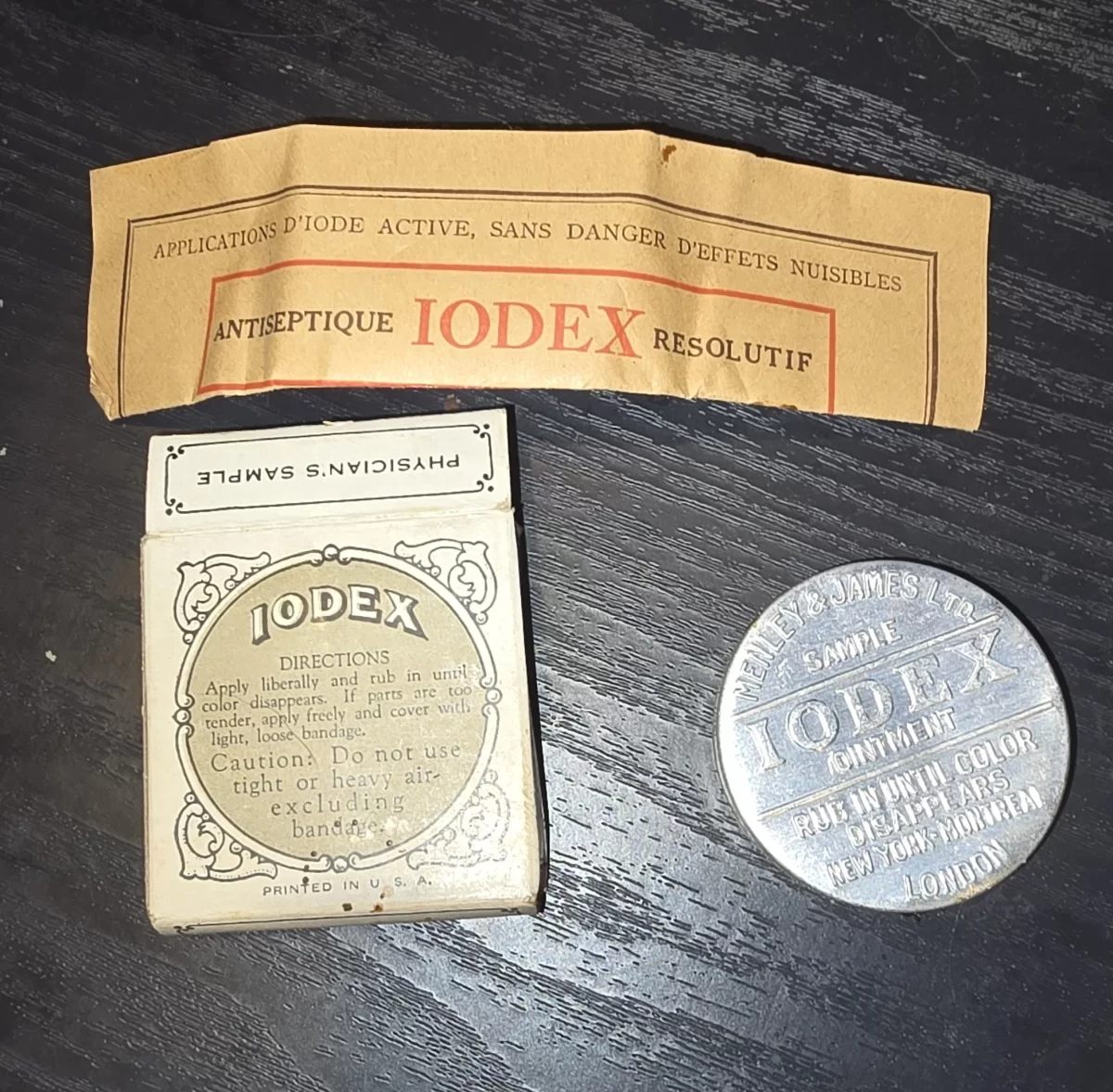 Antique Iodex ointment sample box with embossed tin and vintage packaging.