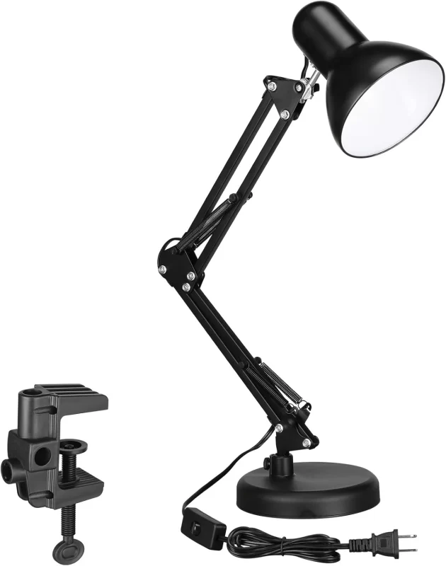 Bostitch VLF100 LED Swing Arm Desk Lamp with clamp mount, shown fully extended on the edge of a desk, featuring sleek modern design and adjustable LED lighting.