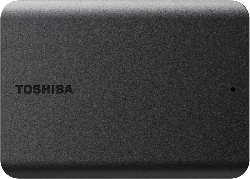 Front view of a black Toshiba portable external hard drive with a smooth matte finish and the brand name "TOSHIBA" embossed on the left side. A small status indicator light is visible on the right.