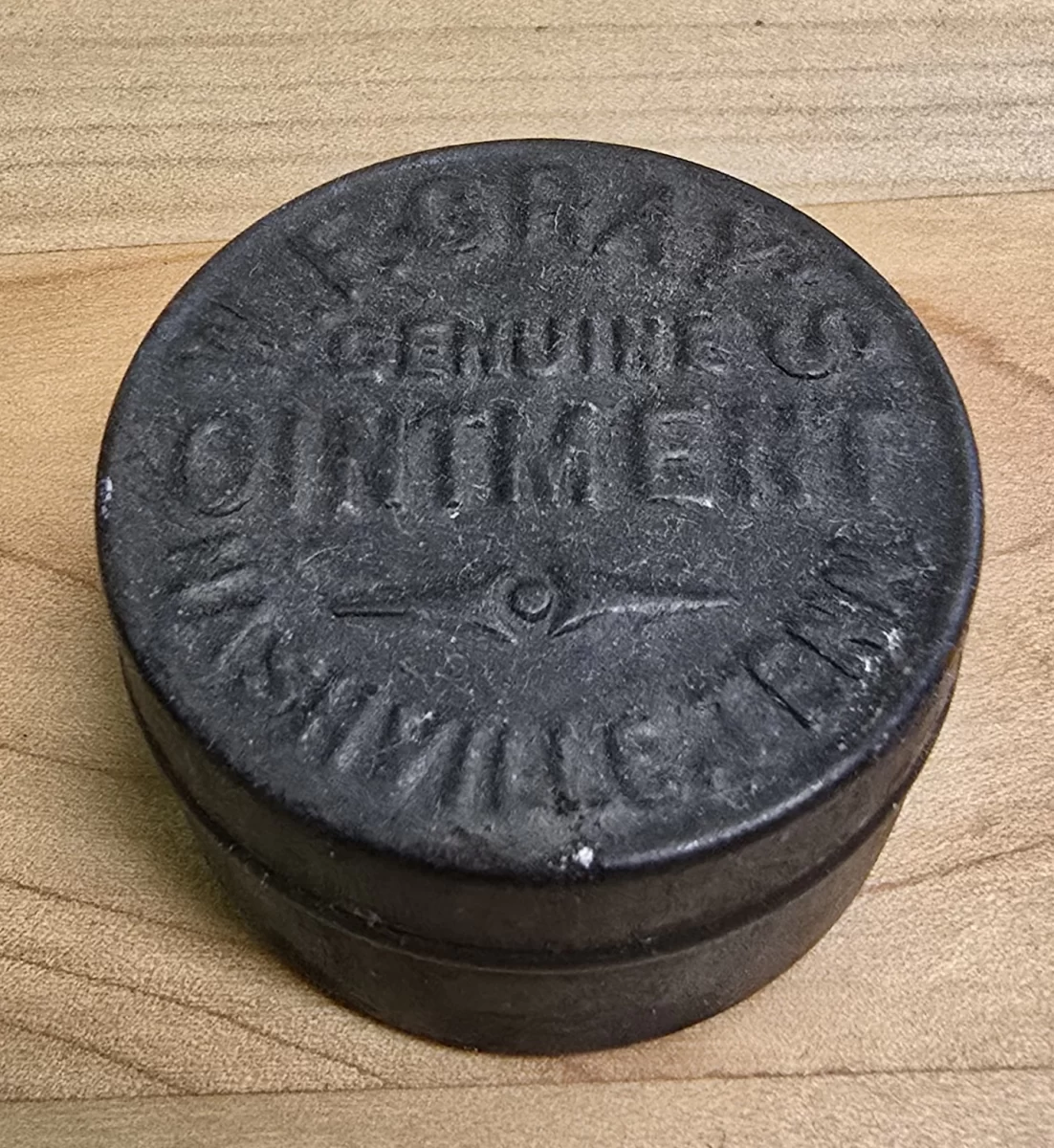 Embossed metal tin of W.E. Gray’s Genuine Ointment, Nashville, Tennessee – antique pharmaceutical salve container.