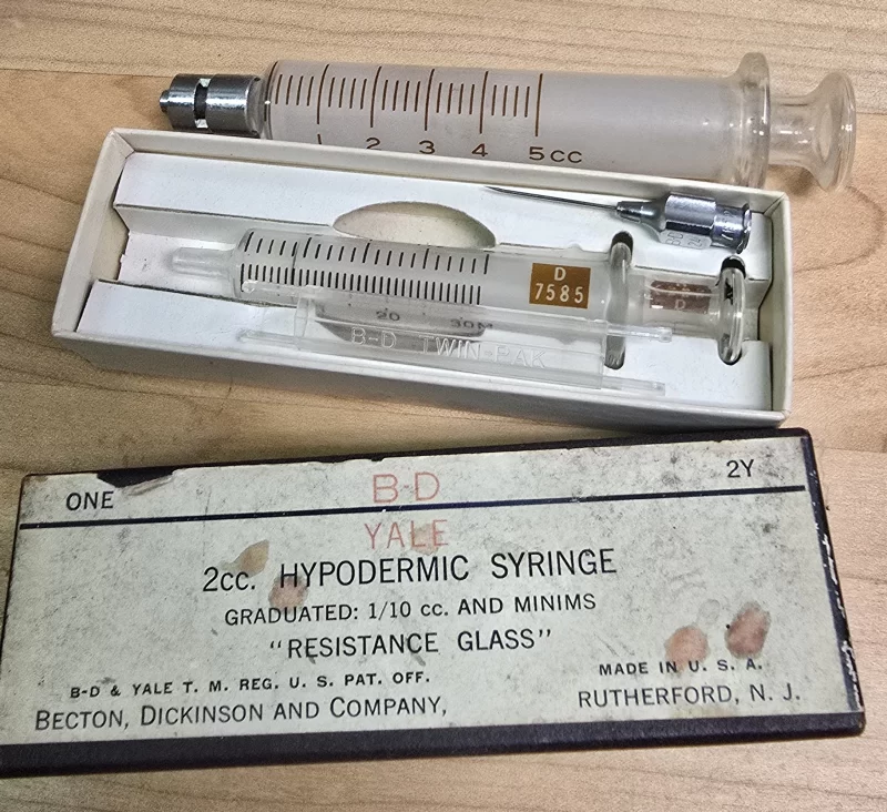 Vintage B-D Yale Resistance Glass 2cc hypodermic syringe in original box with needle and 5cc companion syringe