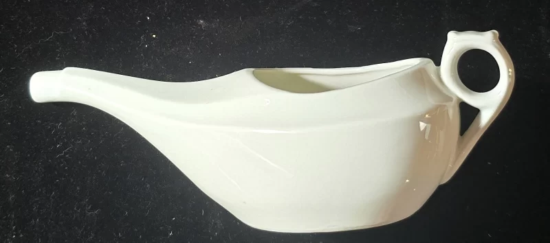 Ceramic neti pot marked WT & C Made in Germany, shown from top, side, and base views