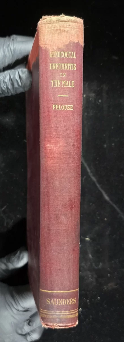 Spine: Book spine showing title "Gonococcal Urethritis in the Male – Pelouze" in gilt.