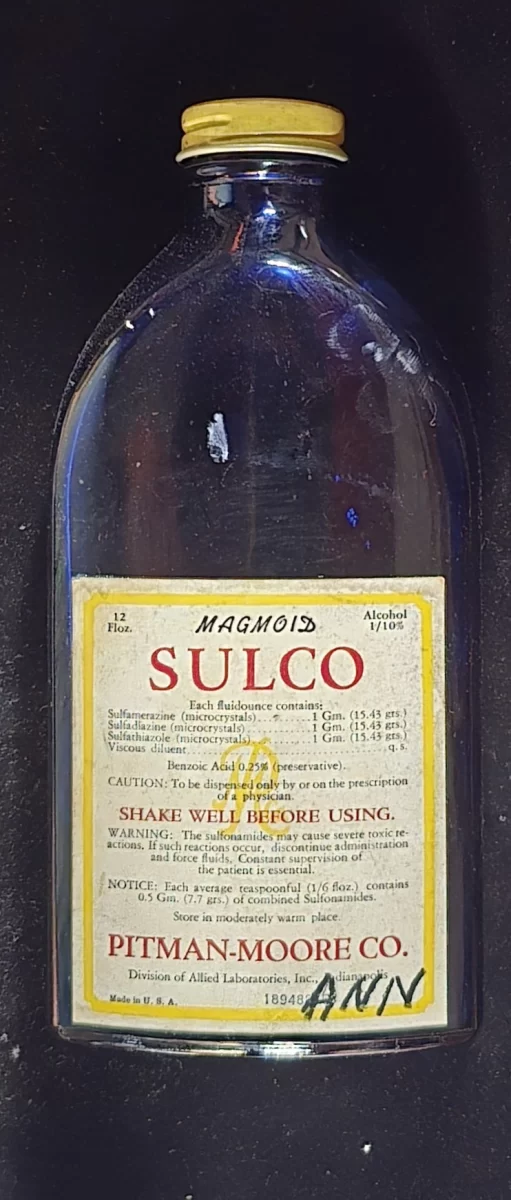 Vintage cobalt blue glass bottle labeled “Magmoid Sulco” from Pitman-Moore Co.