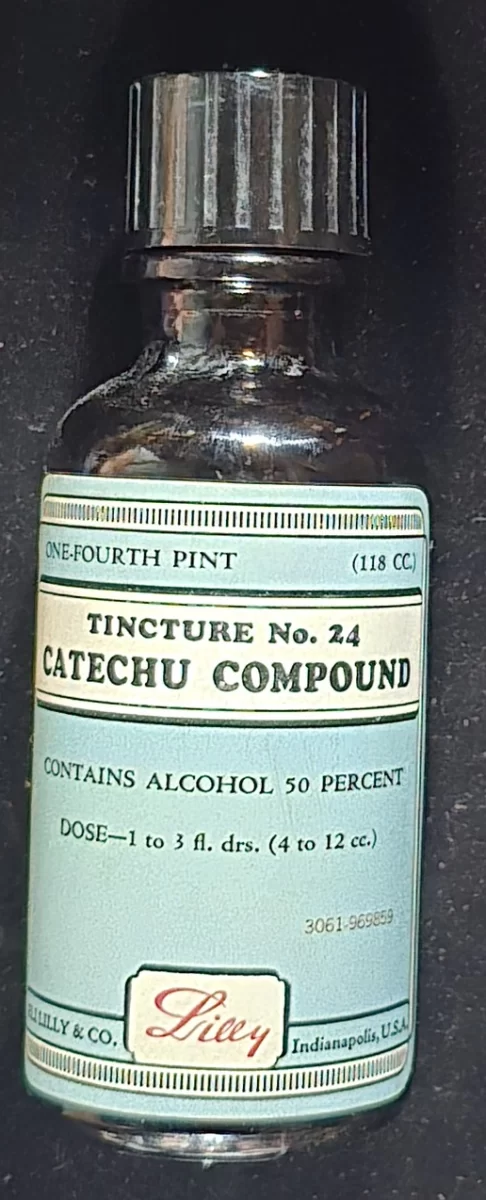 Front view of vintage Eli Lilly Catechu Compound bottle, labeled Tincture No. 24