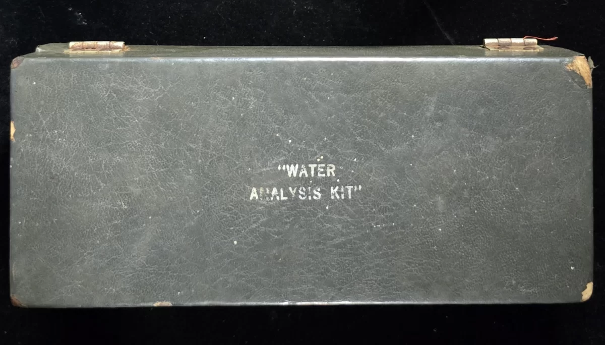 Closed vintage field case labeled "Water Analysis Kit"