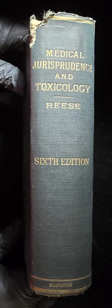 Cloth spine of Reese’s Medical Jurisprudence and Toxicology (1902, Sixth Edition) with gold title and publisher imprint “Blakiston.”