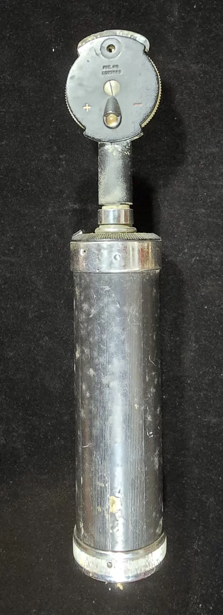 Front view of vintage Wappler No. 112 diagnostic handle with attached ophthalmoscope head
