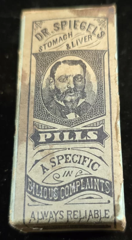 Antique box of Dr. Spiegel’s Stomach & Liver Pills, labeled “Always Reliable” and marketed for bilious complaints.