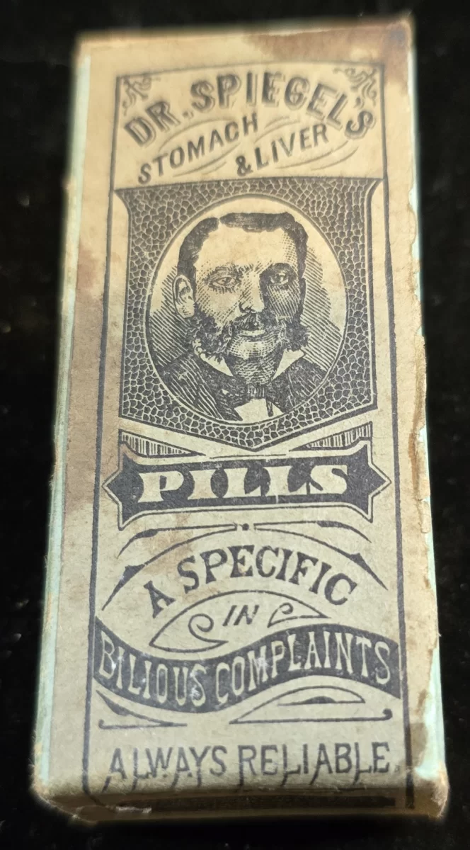 Antique box of Dr. Spiegel’s Stomach & Liver Pills, labeled “Always Reliable” and marketed for bilious complaints.