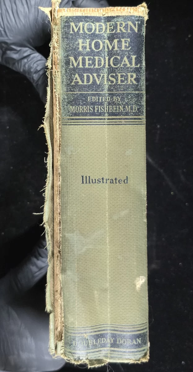 Worn spine of Modern Home Medical Adviser edited by Morris Fishbein, Doubleday Doran