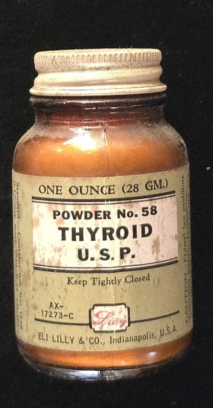 Bottle of desiccated thyroid extract, representing early glandular therapies marketed for energy, vitality, and nutrition.