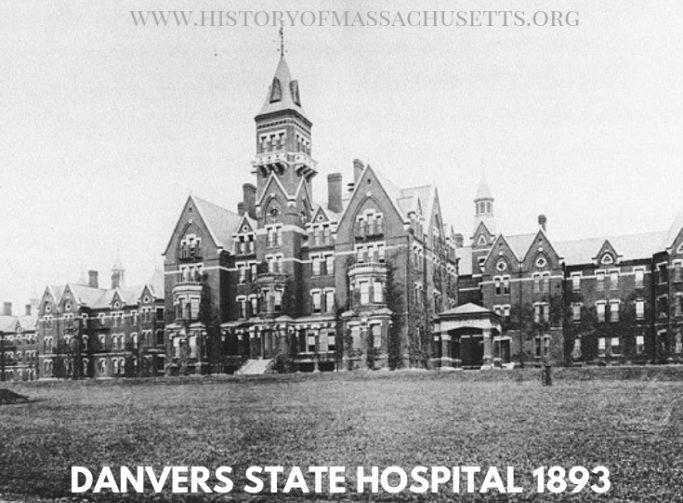 Historic 1893 photograph of Danvers State Hospital in Massachusetts, a Kirkbride-style psychiatric asylum later known for overcrowding, neglect, and controversial treatments.