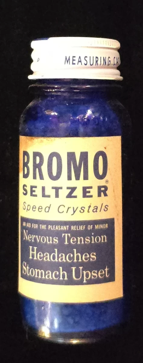 Vintage Bromo-Seltzer Speed Crystals cobalt blue bottle with full label, cap, and contents.