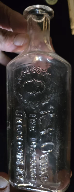 Clear glass embossed druggist bottle, R. L. Orme, Uniontown, KY