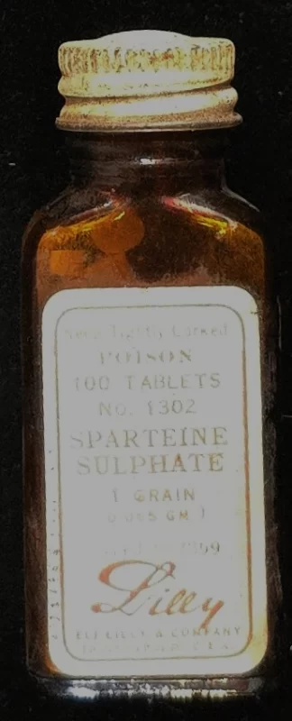 Label reading “Sparteine Sulphate – Poison – 100 Tablets – E. Lilly & Co.”
