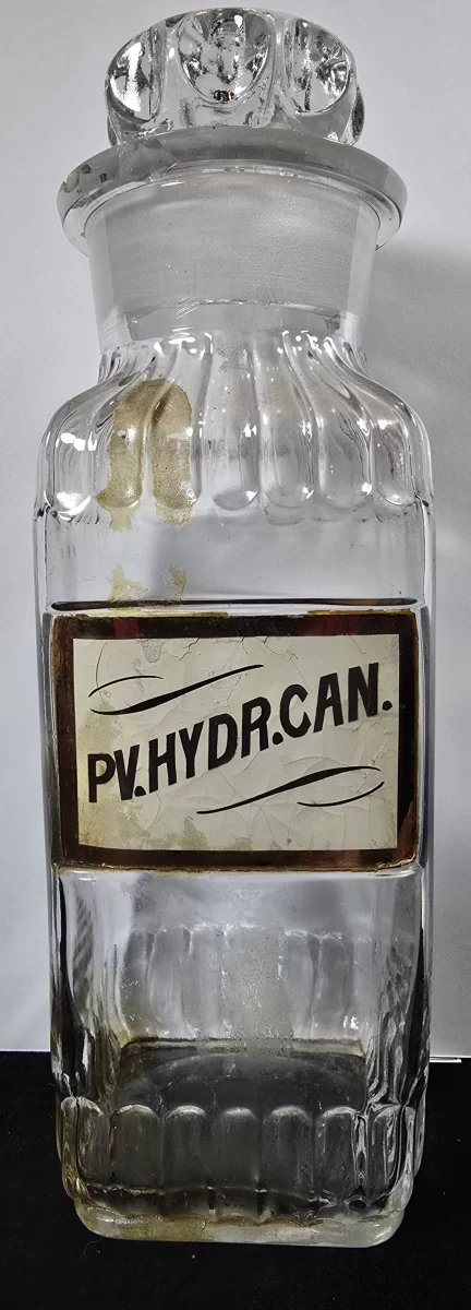 Antique apothecary jar labeled PV.HYDR.CAN. (Pulvis Hydrargyri cum Creta, Mercury with Chalk Powder)