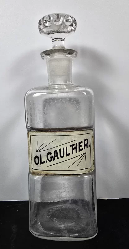 Antique apothecary bottle labeled Ol. Gaulther. for Oil of Wintergreen, with stopper.