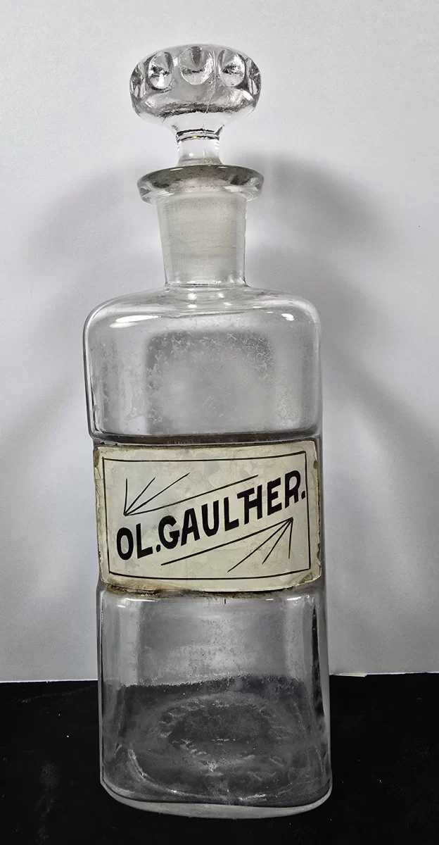 Antique apothecary bottle labeled Ol. Gaulther. for Oil of Wintergreen, with stopper.