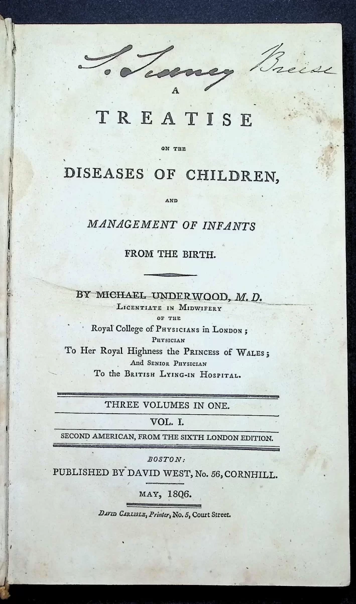 Antique 1806 edition of Michael Underwood’s Diseases of Children, full leather binding with red spine label.