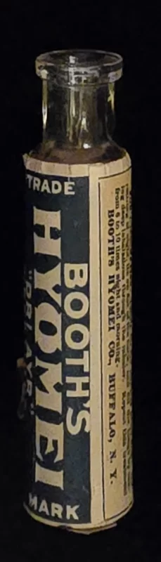 Booth’s Hyomei glass bottle with blue and cream label reading “Dri Ayr” and directions for use.