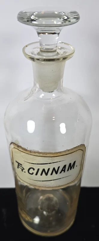 Clear glass Tr. Cinnam. apothecary bottle with stopper,