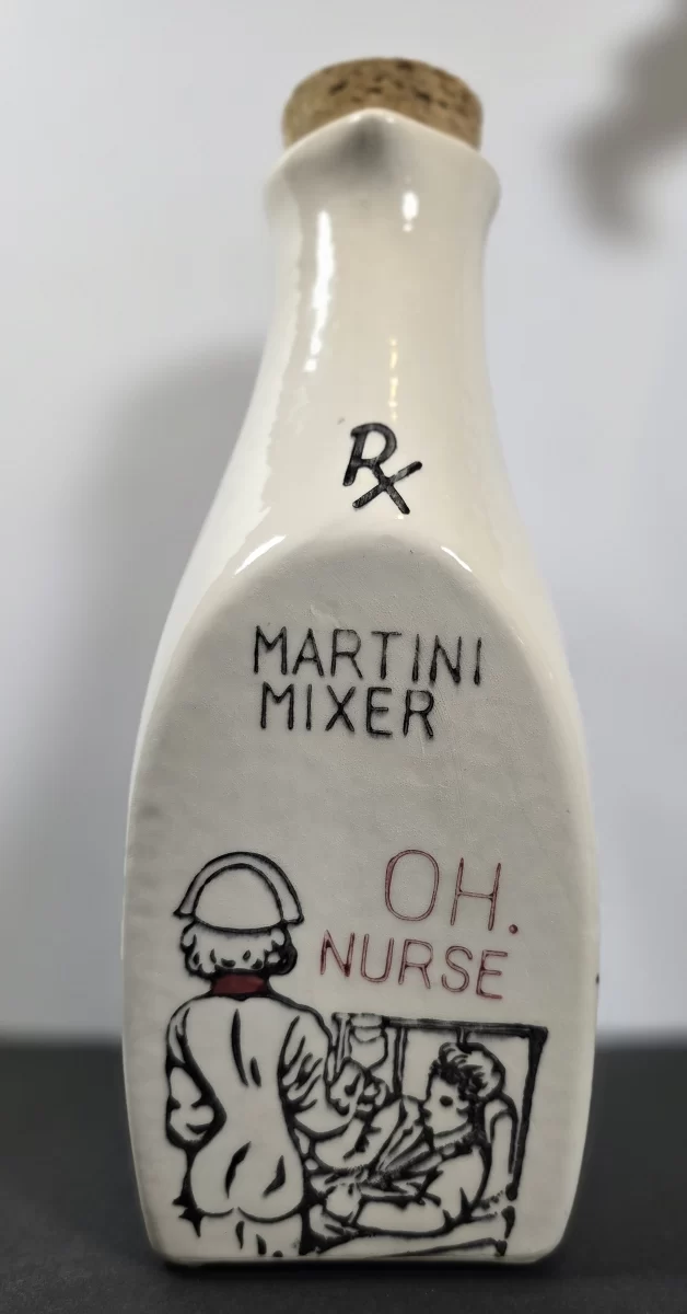 Vintage DeForest of California RX Martini Mixer jug with humorous nurse illustration and cork stopper.