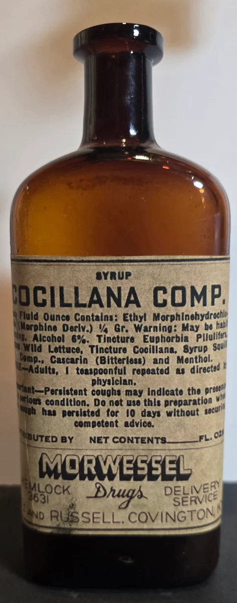 Amber glass Cocillana Compound bottle with Morwessel Drugs label, Covington KY
