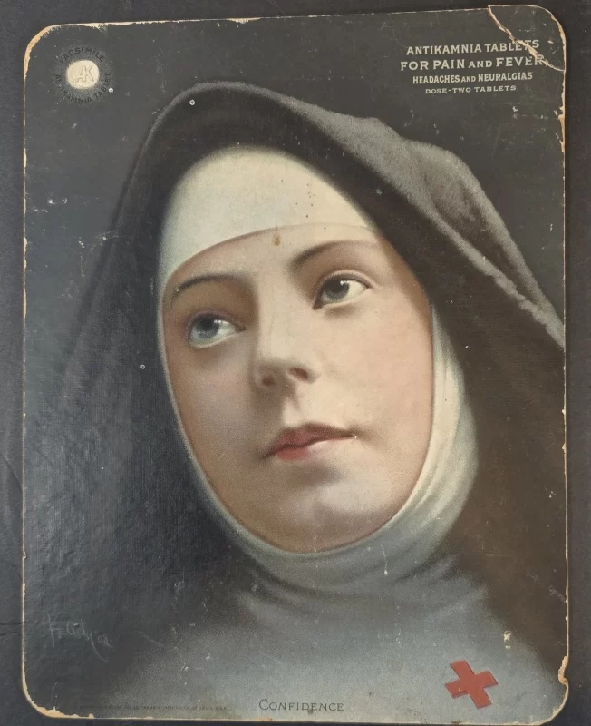 1904 Antikamnia Tablets advertising calendar front showing portrait “Confidence” of a nun/nurse promoting pain and fever tablets.