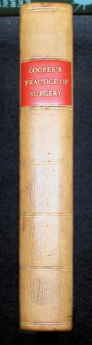 1828 Cooper’s Practice of Surgery by Samuel Cooper – antique surgical reference, full leather binding, interior pages showing operative techniques.