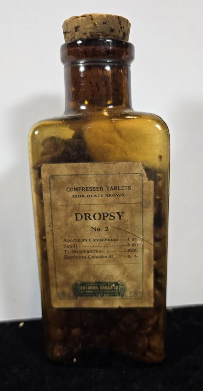Amber bottle of Kremers–Urbanto Dropsy No. 2 compressed tablets with original label and cork.