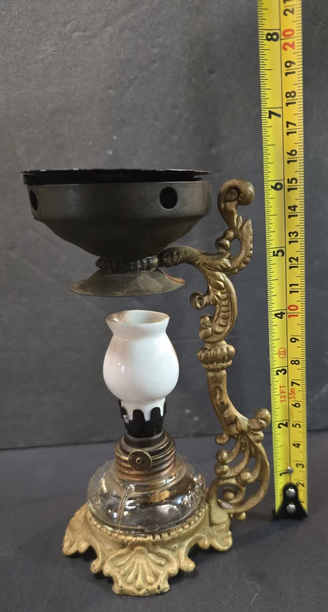 Antique 1800s Vapo-Cresolene inhalation lamp with glass alcohol burner and ornate brass stand.