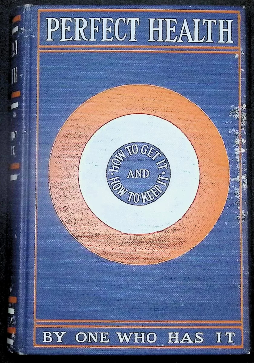 1902 clothbound book Perfect Health by Charles Courtney Haskell with decorative blue, white, and gold cover.