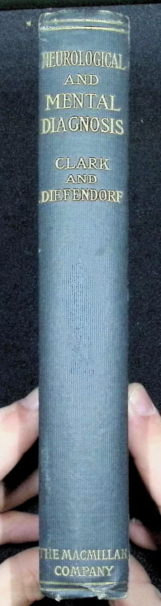 1908 copy of Neurological and Mental Diagnosis by Clark and Diefendorf with blue cloth spine and gilt lettering.