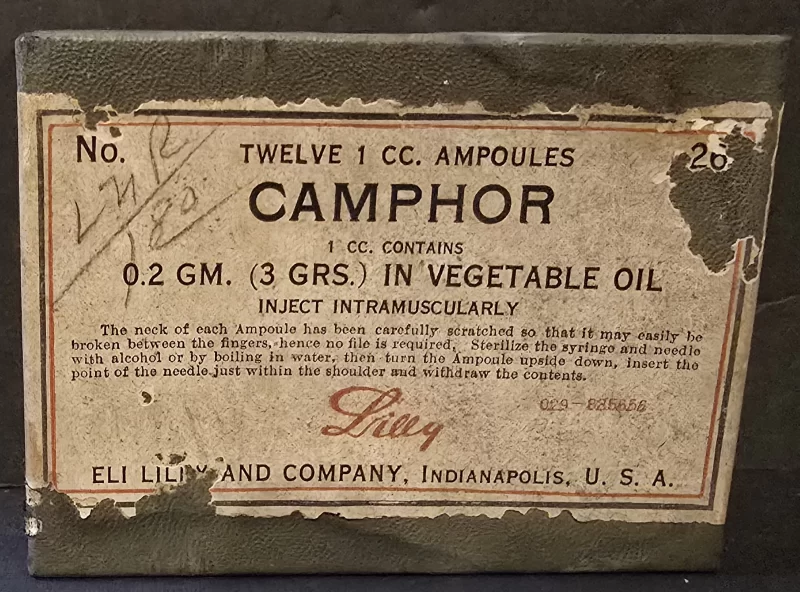 Eli Lilly & Co. injectable camphor box label, No. 26, twelve 1 cc ampoules, 0.2 gm (3 grs.) in vegetable oil, inject intramuscularly.