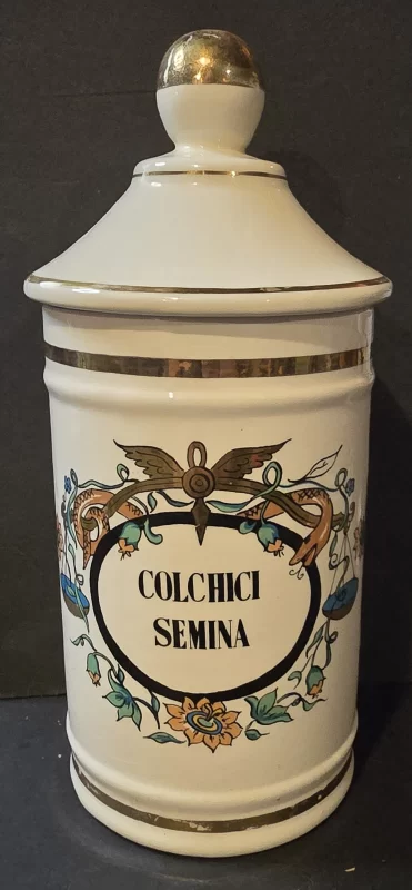Front view of Colchici Semina apothecary jar with ornate cartouche and floral design